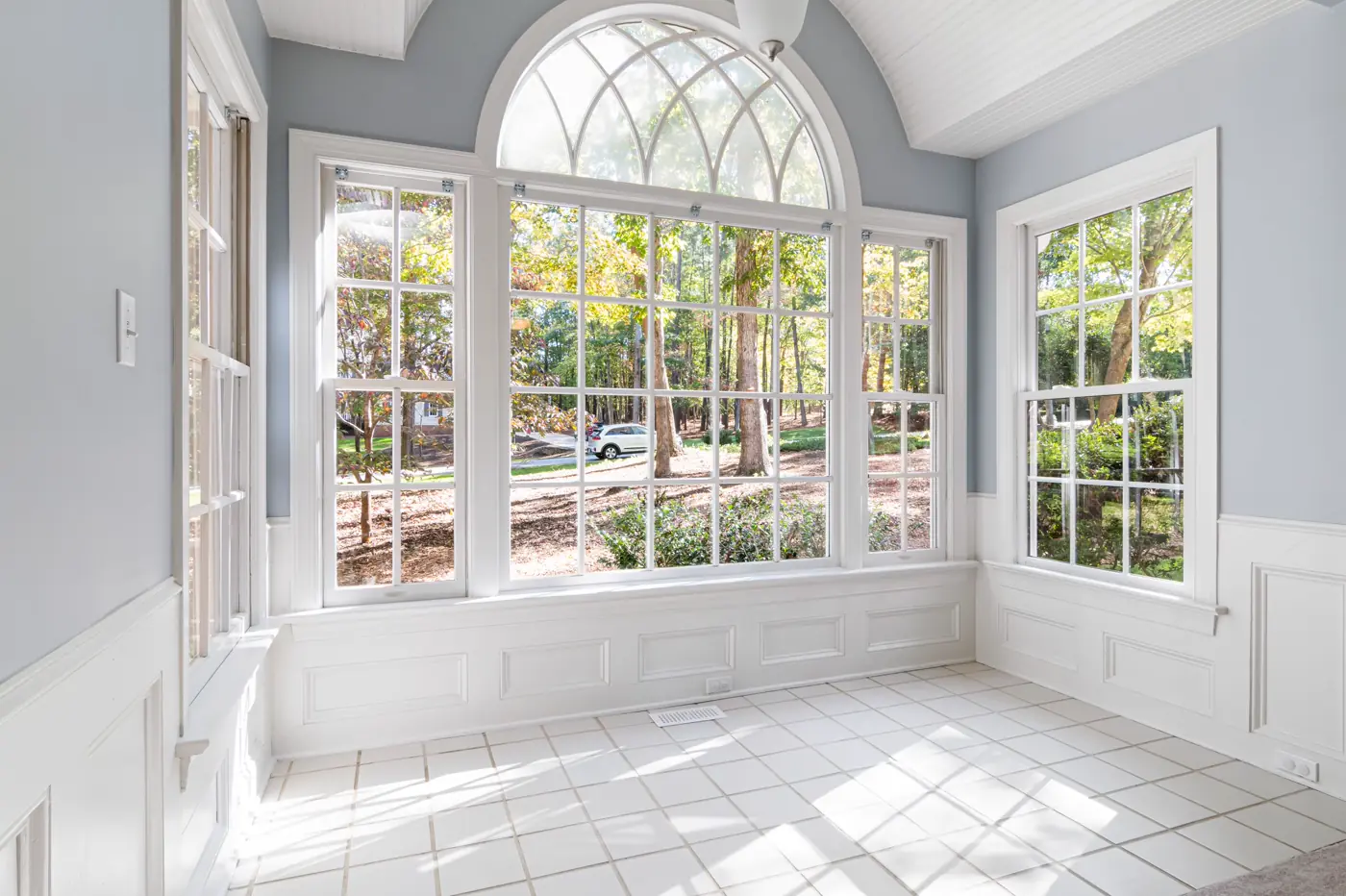 Bright replacement windows on a residential home